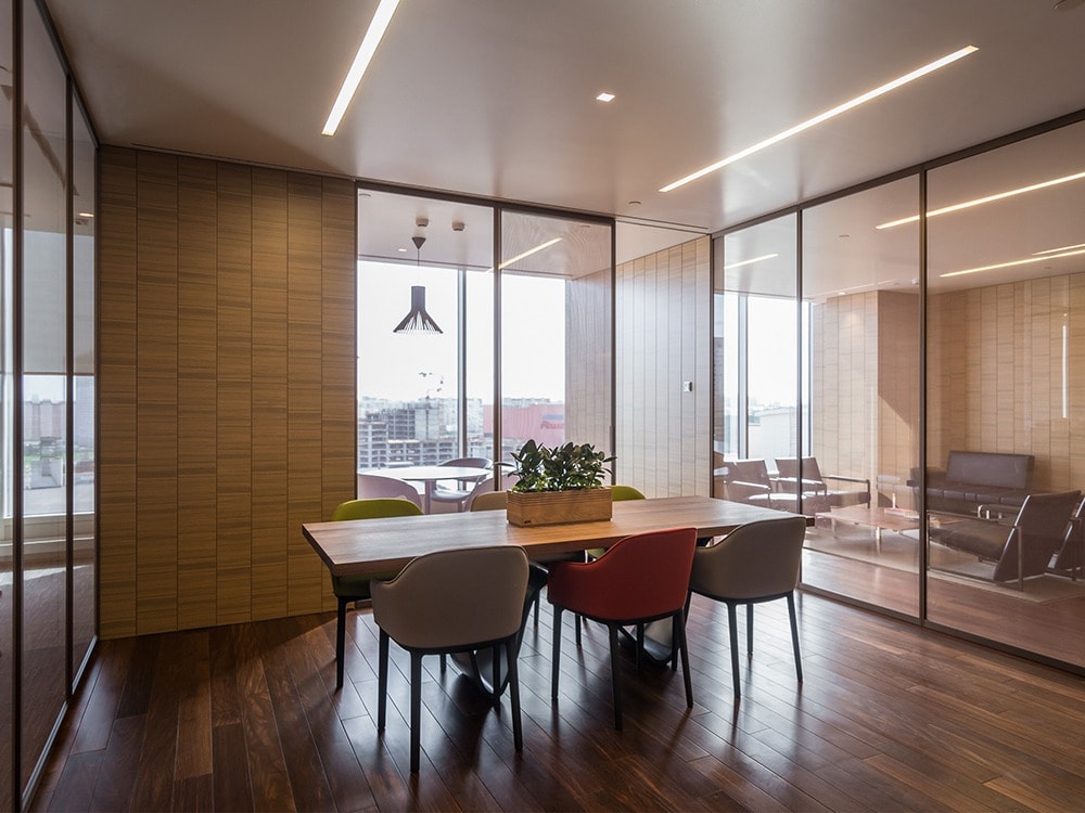 LEDs and natural daylight in modern office block meeting room