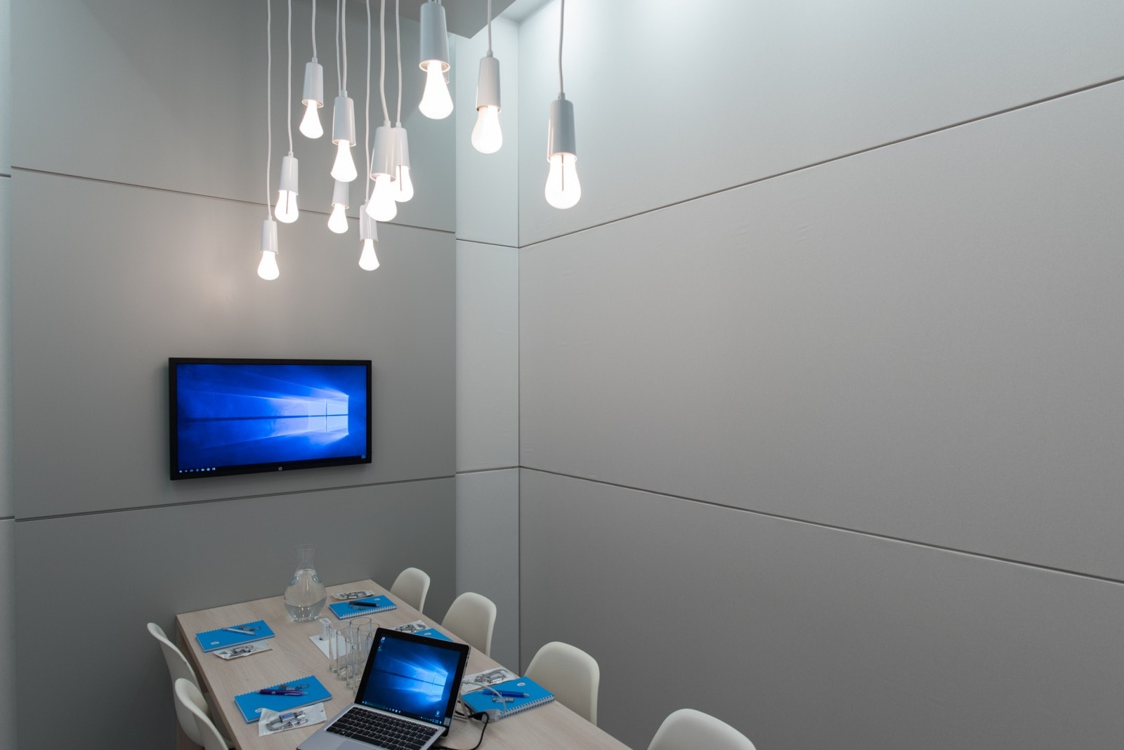 Modern office pod with falling string light-bulbs