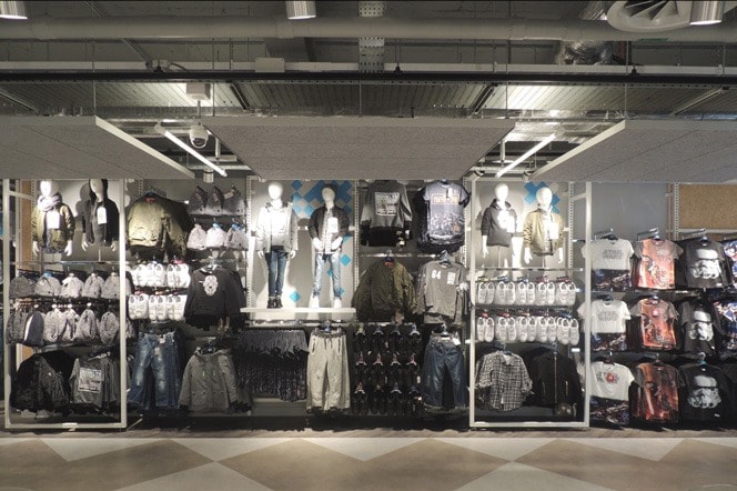 Track lighting used in clothing store