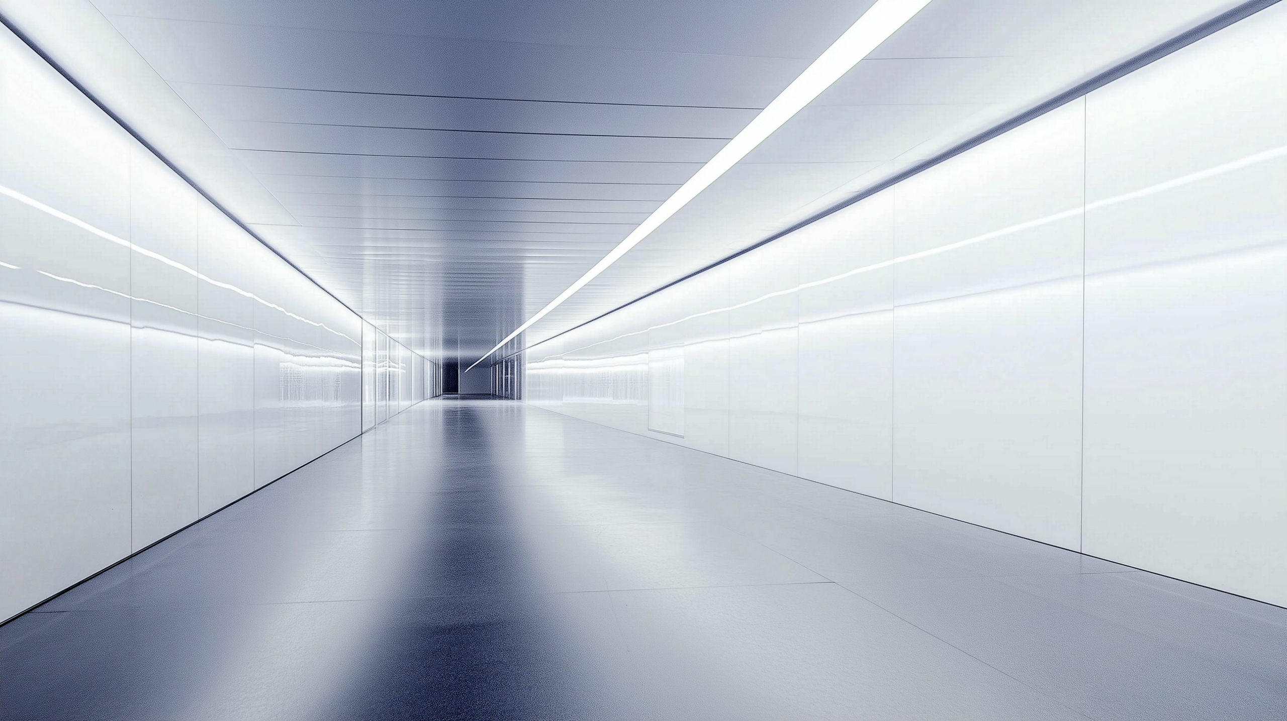 Endless corridor bathed in soft white light evokes a sense of modernity and tranquility